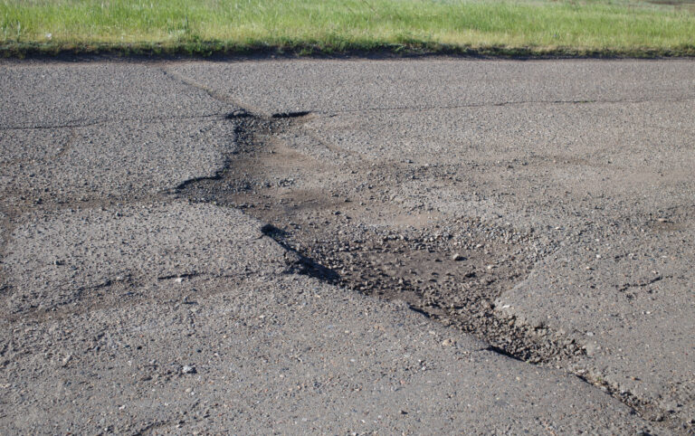 Pot hole in a asphalt road